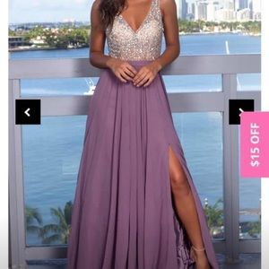 Dress size small 0-4. Brand new, never worn!